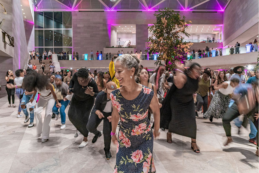 Group dancing inside National Gallery of Art