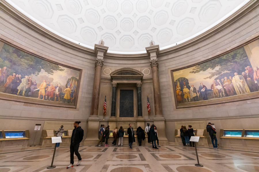 People gathering inside the National Archives