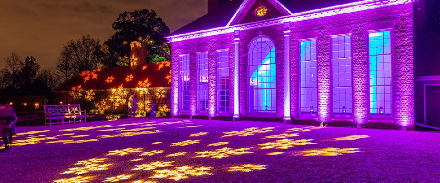 Mount Vernon estate lite up for the holidays in pink lights with snowflakes