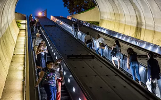 Metro riders on escalator at Dupont Circle north exit

