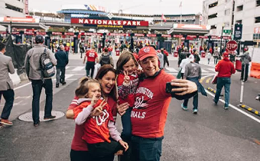 Family taking selfie at Nationals Park
