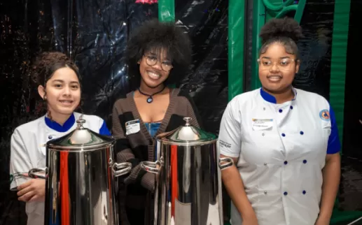 Seniors at Ballou High School Academy of Culinary Arts serving hot drinks at the AEF Annual Holiday Celebration
