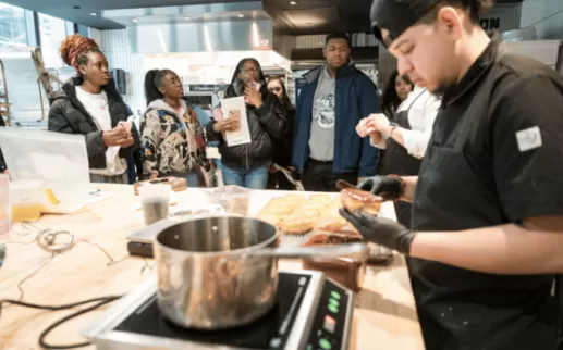Students enrolled in culinary academies visit Love, Makoto and watch cooks prepare food

