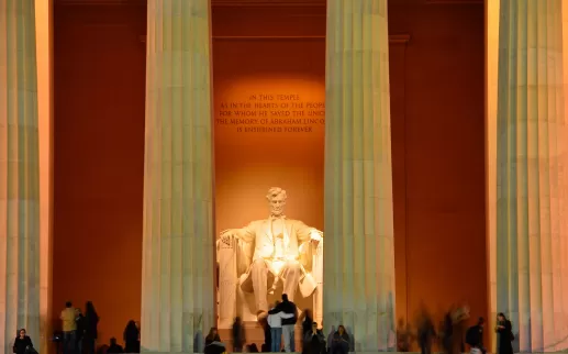 lincoln memorial statue crowded at night
