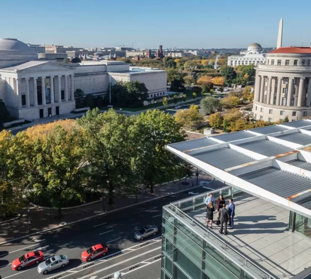 Meeting taking place on the Newseum terrace overlooking Washington, DC's museums and more
